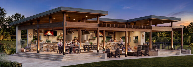 Rendering of an amenity pavilion with outdoor kitchen, fireplace, and residents dining at dusk